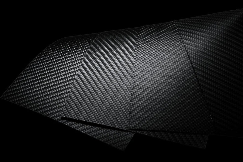 Carbitex CX6 flexible carbon fiber sheets landscape macro — COLDFIRE wallet structural shell
